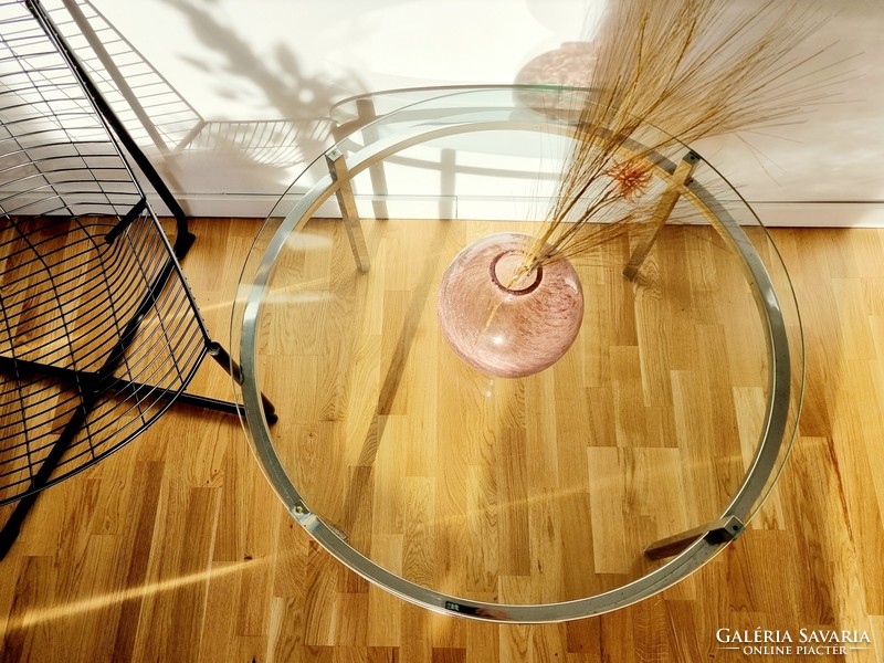 Mid-century round coffee table with metal frame, glass table