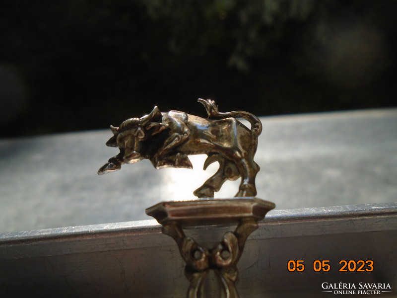 Unique goldsmith's figural miniature bull on a zodiac pedestal, silver decorative spoon