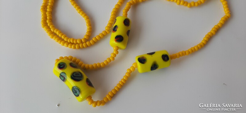 Vintage long string of yellow glass beads