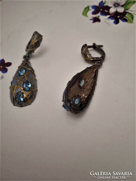 Beautiful handmade earrings with blue stones.