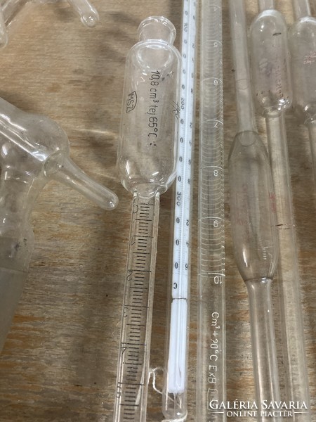 Old milk measuring bottles