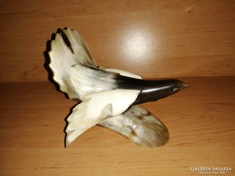 Retro carved hornbill bird (7p)