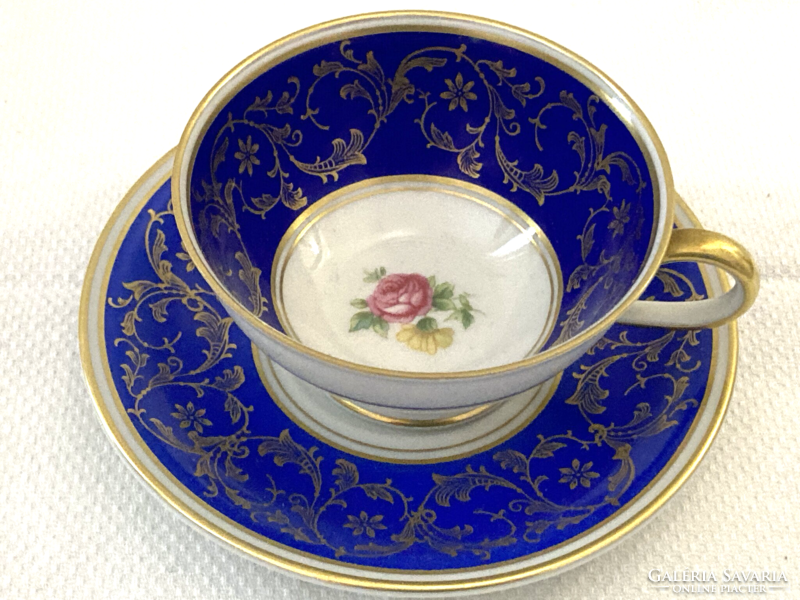Antique porcelain coffee cup with coaster