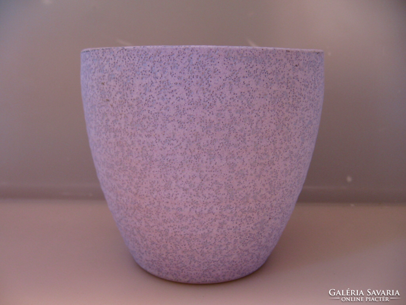 Purple, medium-sized ceramic bowl with a rough surface