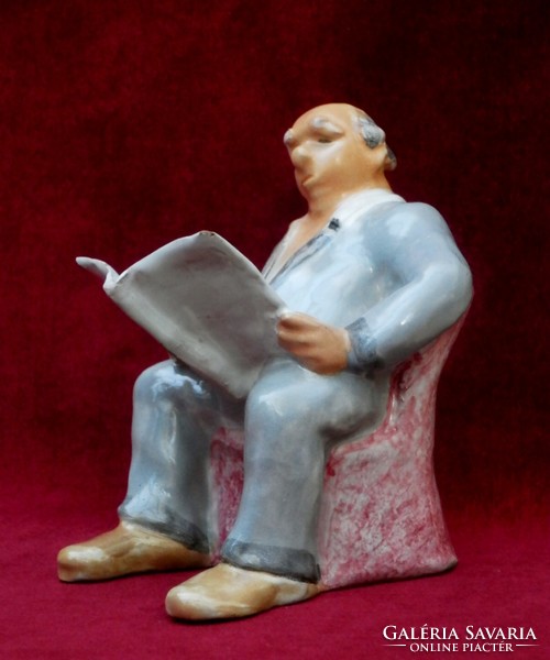 Jenő Eschenbach reading a newspaper glazed ceramic