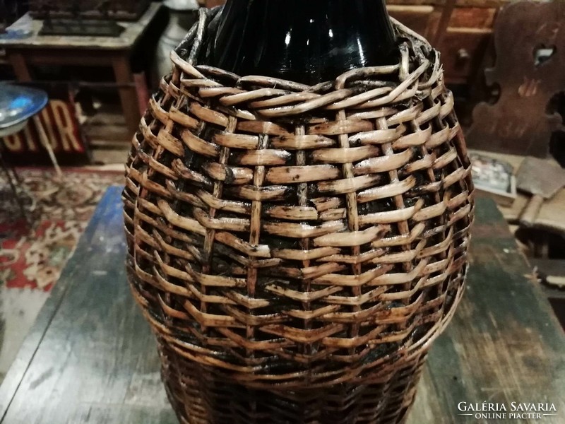 Wicker old glass, perhaps with petroleum in front of it, a wine demizon, large size, for sale as a floor vase