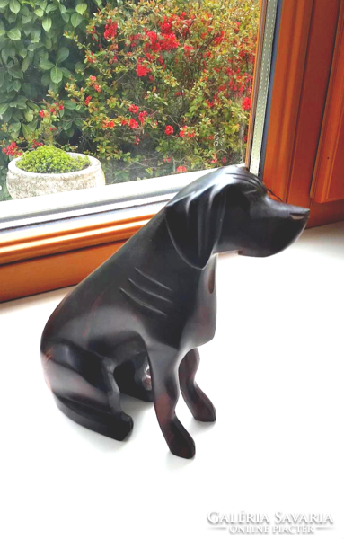 Small wooden dog statue