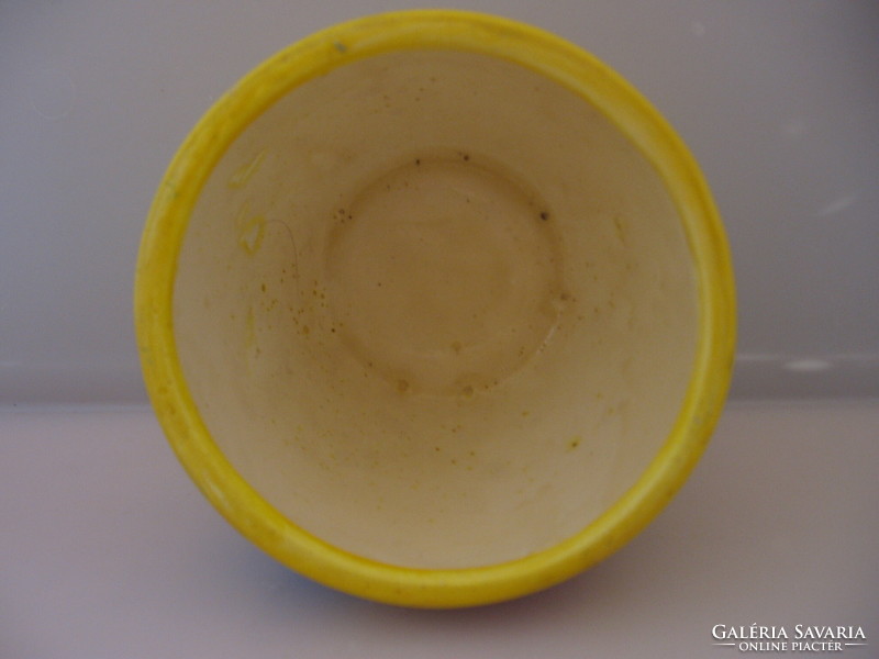 Ceramic bowl with a yellow heart pattern
