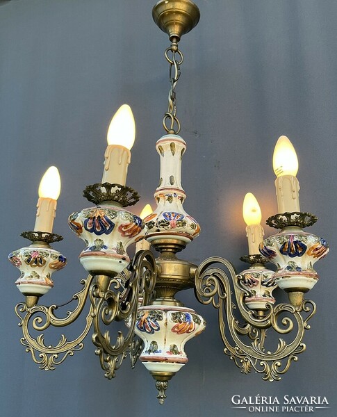 Bronze chandelier with majolica inlay.