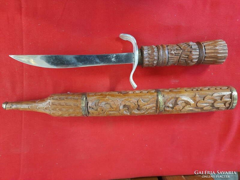 Hand-carved wooden, metal-bladed dagger, sword, decorative sword.