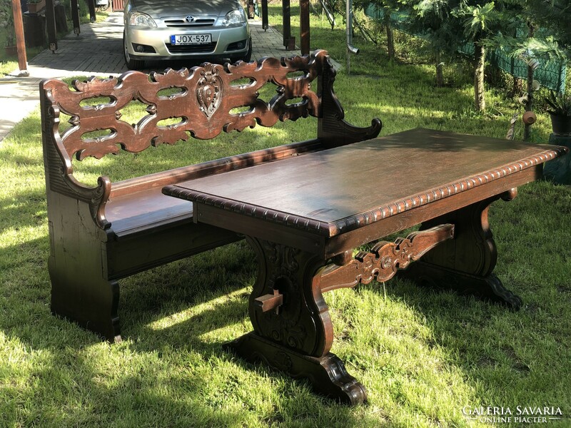 Unique richly carved table with bench for sale