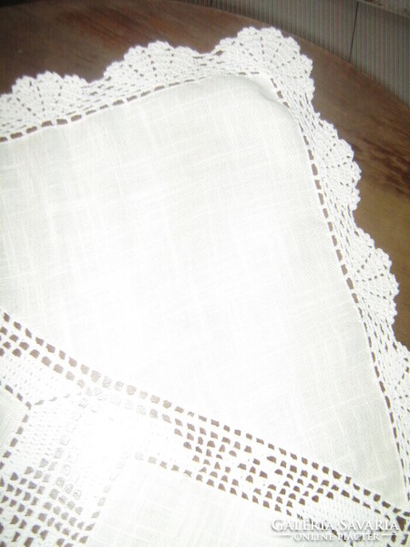 Beautiful butter yellow tablecloth with hand-crocheted edges and inserts