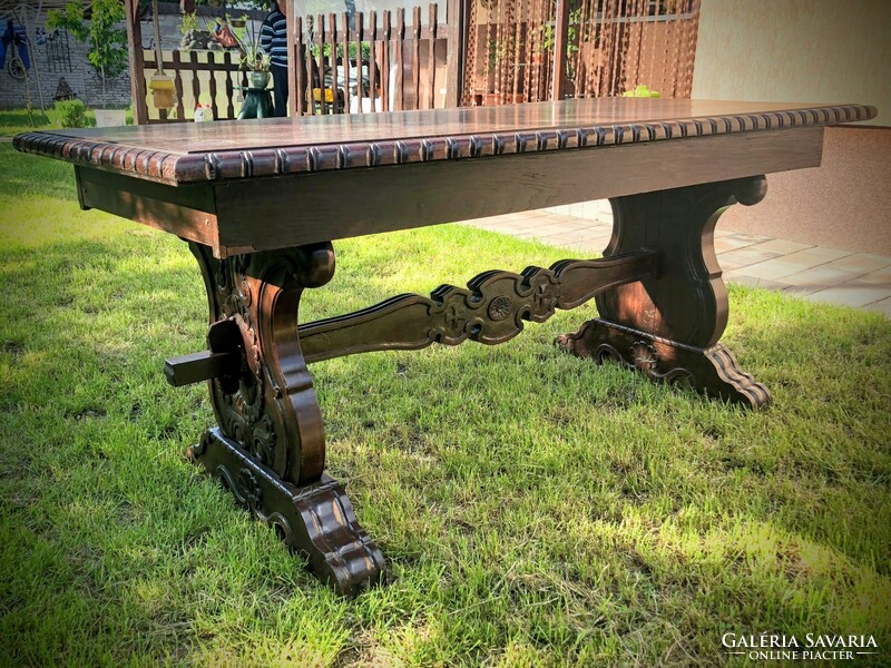 Unique richly carved table with bench for sale