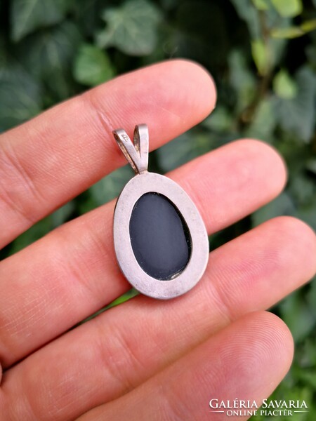 Silver pendant with chalcedony stone