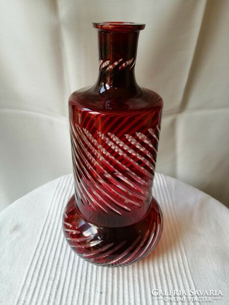 Burgundy polished glass bottle