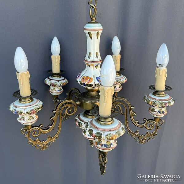 Bronze chandelier with majolica inlay.