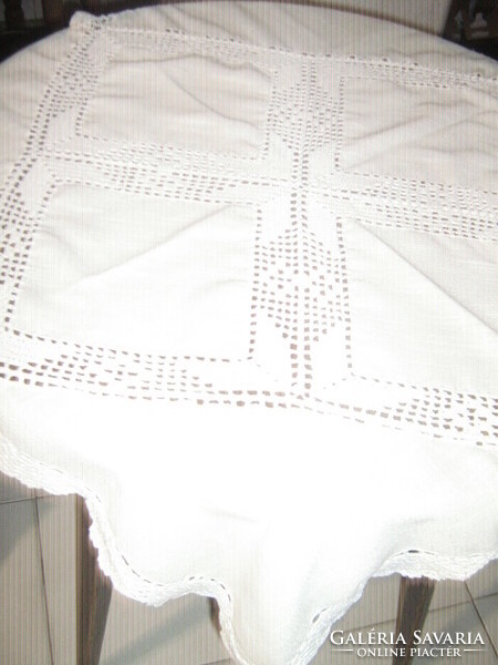 Beautiful butter yellow tablecloth with hand-crocheted edges and inserts