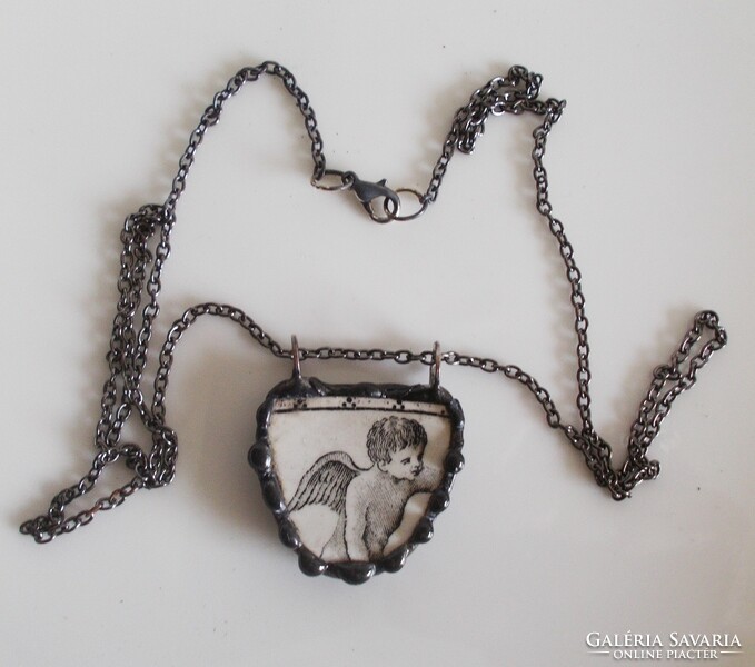 Handmade pendant made of antique faience