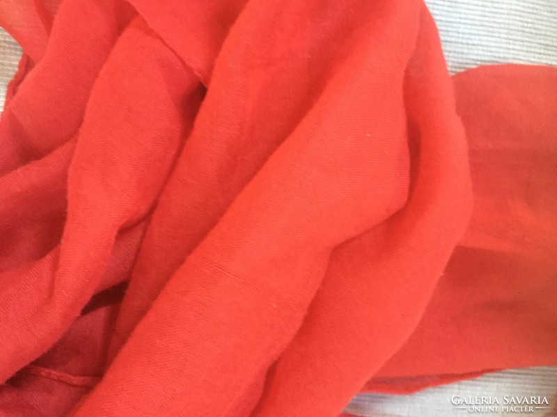 Young, solid red German round scarf made of gauze-like material