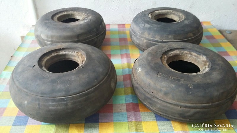 Four old small rubber wheels - tires (predecessors of 3 cordatic -taurus)