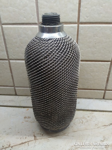 Retro metal mesh 2 liter soda bottle without head for sale!
