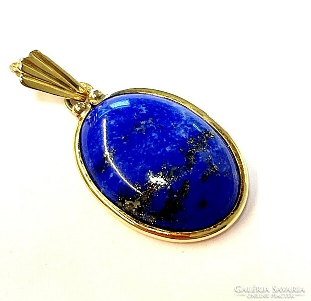 Lapis lazuli stone pendant in a gold frame