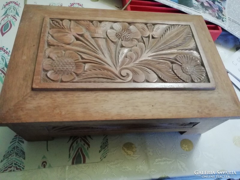 A very beautiful antique wooden chest richly decorated in perfect condition