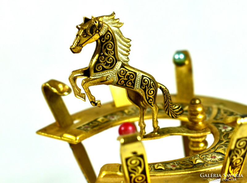 Small fork set with Spanish snacks on a equestrian figure stand