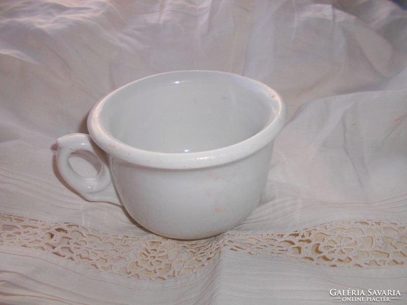 Antique thick porcelain comma mug