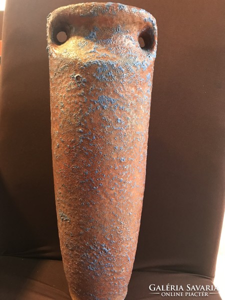 A large ceramic vase with a beautiful bright glaze