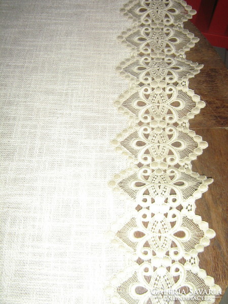 Beautiful and elegant dove gray woven tablecloth with a lace edge