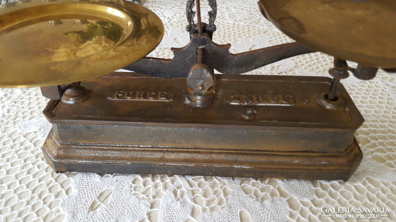 Old force cast iron two-plate scale