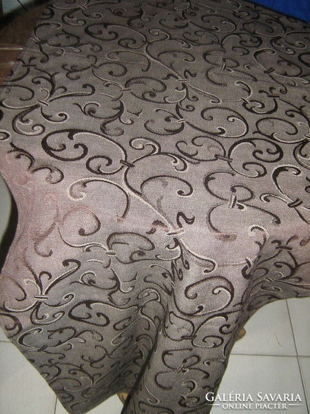 Beautiful brown tablecloth runner with an elegant baroque pattern