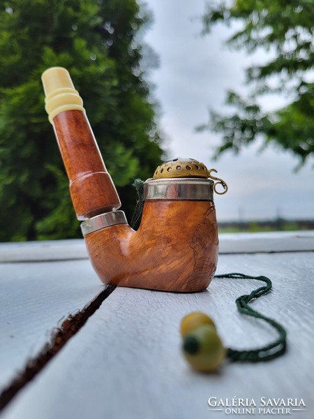 A rare carved pipe with a lid