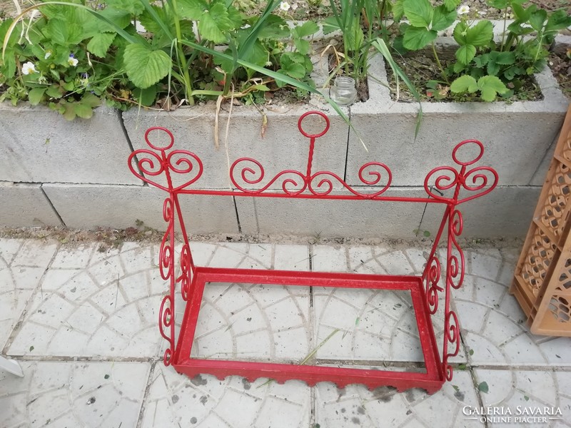 Old wrought iron shelf with nice decoration