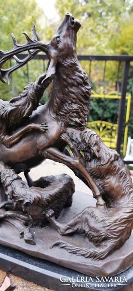 Hunting dogs attacking deer - monumental bronze sculpture artwork