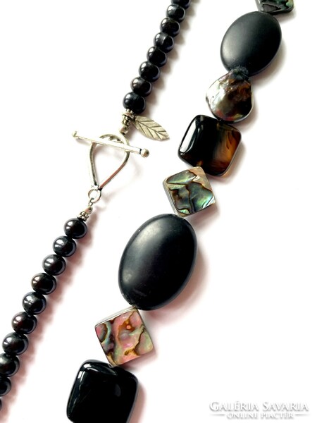 Black cultured pearl string with heliotis shell and lava stone