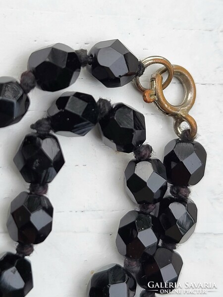 Old, faceted, onyx stone necklace