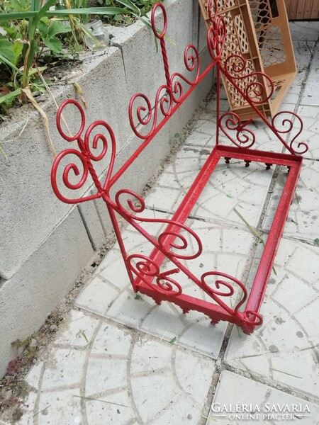 Old wrought iron shelf with nice decoration