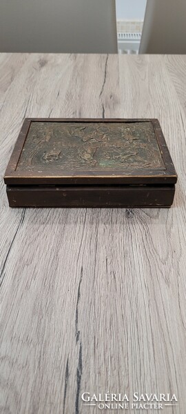 Antique wooden box with copper relief. Souvenir from Warsaw.