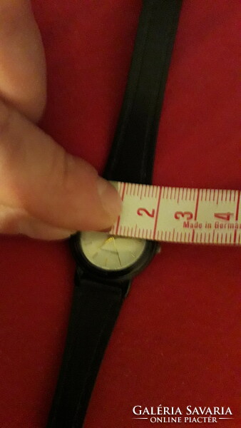 Old casio waterproof quartz women's watch with untested plastic strap as shown in the pictures