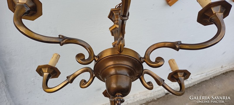 Six-branch bronze chandelier for sale.