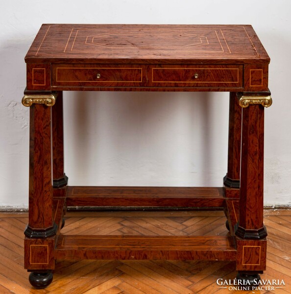 Inlaid chest of drawers with stylized pillar legs