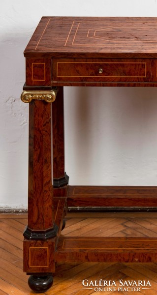 Inlaid chest of drawers with stylized pillar legs