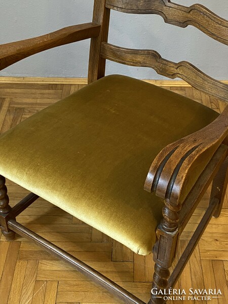 Elegant pewter arm chair in stable room condition, even next to a desk