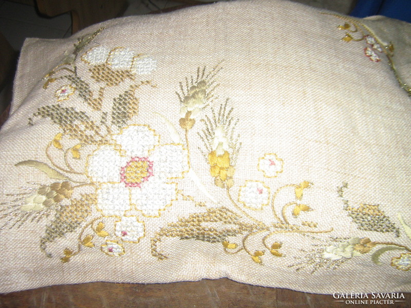 A beautiful hand-embroidered ready-to-sewn decorative pillow