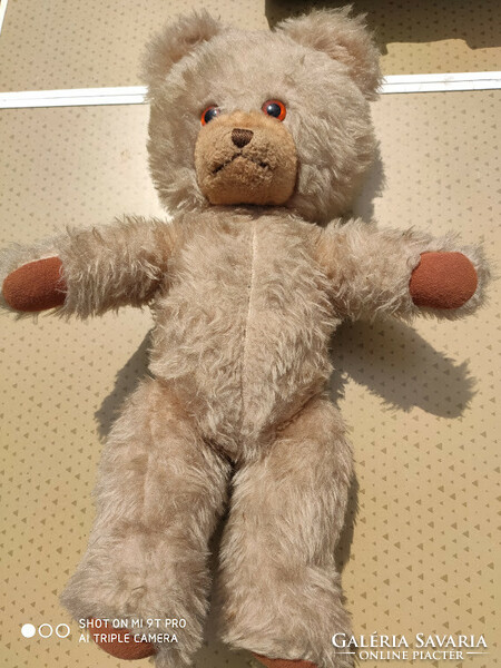 Antique crying teddy bear