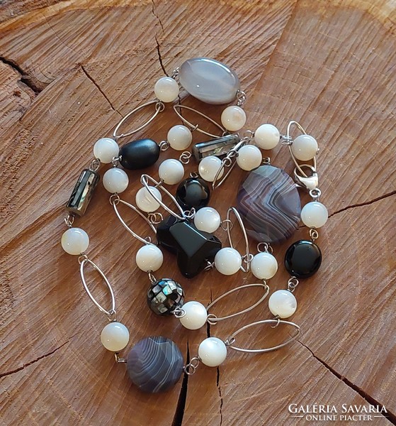 Special long silver necklace with onyx and mother-of-pearl minerals