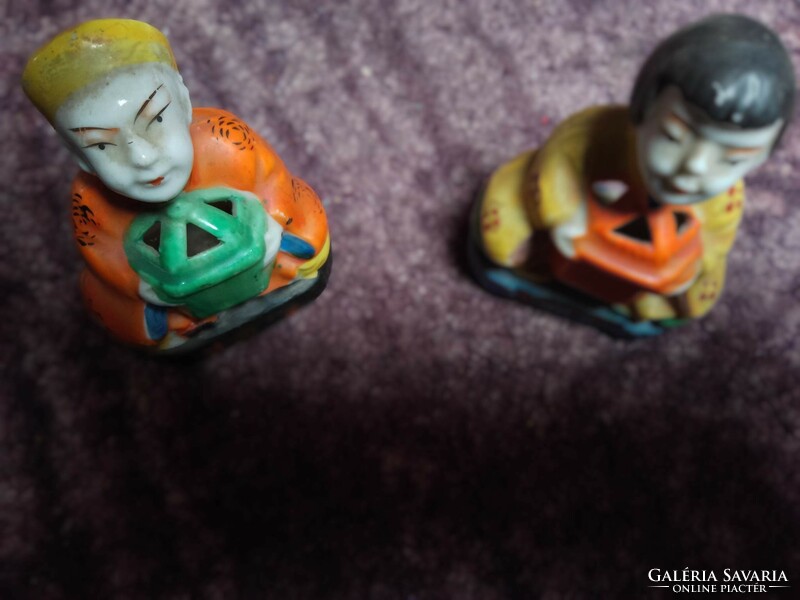 Occupied Japanese porcelain figurines