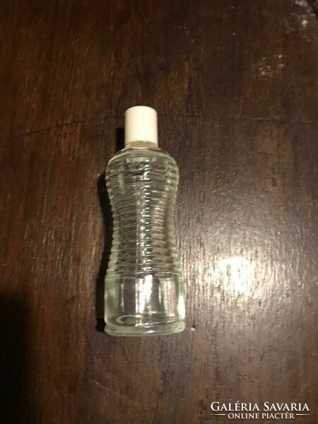 Perfume/cologne glass. In unbroken and cracked condition. Size: 14 cm high and 14 cm in circumference